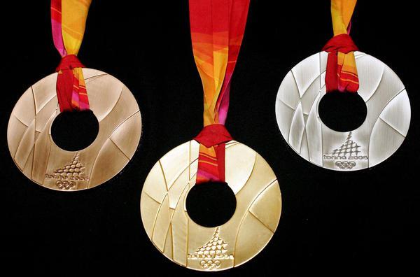 olimpiskā zelta medaļa foto